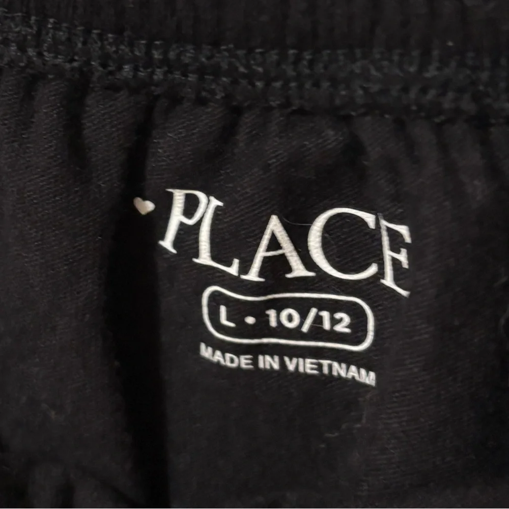NWT The Children’s Place girl’s black draped shoulder top 10/12